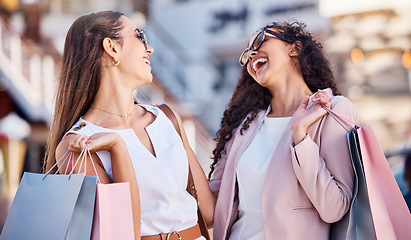 Image showing Shopping, happy and women with bags in the city together for a luxury sale, discount or promotion. Happiness, rich and fancy girl friends on shopping spree for fashion, boutique and expensive clothes