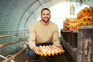 Image showing Portrait, chicken farmer and man with eggs at farm in barn or chicken coop. Agro sustainability, food agriculture and happy male small business owner holding organic poultry products, egg and protein