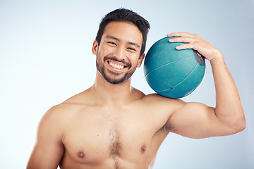 Image showing Man, studio and fitness with smile, medicine ball and happiness for wellness, muscle and training goal. Model bodybuilder, portrait and happy with workout ball, exercise and body beauty by background