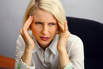 Image showing Woman with severe Headache (Migraine). 