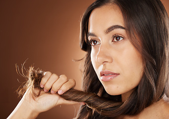 Image showing Hair, beauty and skincare with a model woman in studio on a brown background for natural or keratin treatment. Face, haircare and salon with an attractive young female posing to promote a product