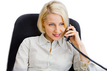 Image showing Young businesswoman talk on the phone in the office
