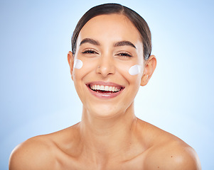 Image showing Portrait, skincare and moisturizer with a model woman in studio on a gray background for antiaging beauty. Face, lotion and product with an attractive young female inside to apply facial treatment