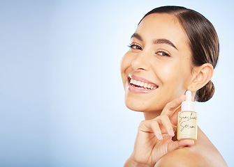 Image showing Skincare, beauty and face of woman with serum for skincare products, facial treatment and dermatology. Healthcare, wellness and female advertising natural oil, beauty products and cosmetics in studio