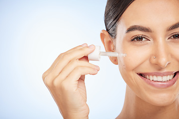 Image showing Face portrait, skincare and woman with serum in studio on a mock up background. Wellness, facial cosmetics and female model with essential oil, hyaluronic acid and product for skin health and beauty.