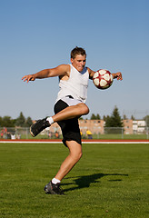 Image showing kicking a soccer ball 