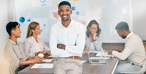 Image showing Corporate black man, team leader and smile at business meeting, planning and financial strategy in office. African businessman, happy leadership and budget meeting with business people for accounting