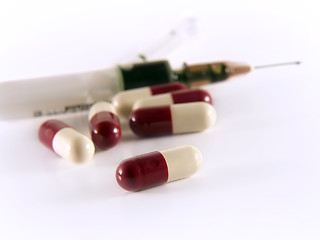 Image showing Pills and medical Syringe