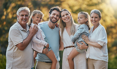 Image showing Love, family and grandparents with girls, parents and smile together for bonding, loving and garden. Portrait, grandmother and grandfather with mother, father and daughters for vacation and park.