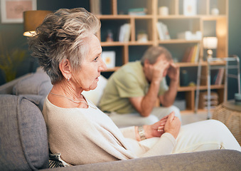 Image showing Divorce, stress or old couple in counseling therapy for helping advice in a toxic marriage relationship. Conflict, fighting or sad old woman thinking on sofa with an unhappy or upset senior partner