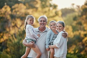 Image showing Grandparents, kids and smile at outdoor, park or backyard for bonding, love and care in nature. Senior couple, girl children and happiness together for vacation, portrait and sunshine in Los Angeles