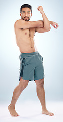 Image showing Man, body or stretching arms on studio background in workout start, exercise pain relief or training healthcare wellness. Portrait, sports athlete or fitness model warm up of strong muscles