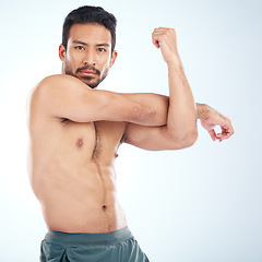 Image showing Man, body or stretching arms on studio background in workout start, exercise pain relief or training healthcare wellness. Portrait, sports athlete or fitness model warm up of strong muscles