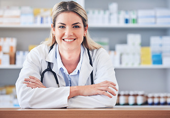 Image showing Woman, portrait or happy pharmacist with working or helping with medical advice in pharmacy or wellness clinic. Face, doctor or healthcare worker smiles with pride or goals in retail drugstore shop