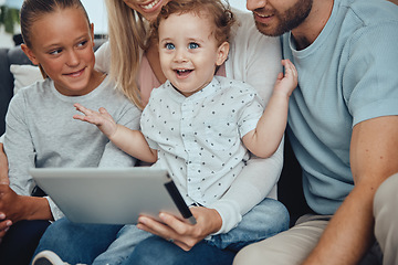 Image showing Digital tablet, relax and happy family on sofa streaming a movie online together at their home. Happiness, fun and parents with their children watching video on the internet or social media on mobile