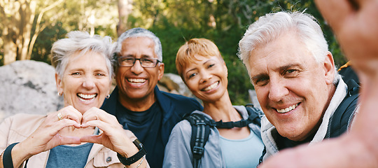 Image showing Nature, selfie and senior friends hiking together in a forest while on an outdoor adventure. Happy, smile and portrait of a group of elderly people trekking in woods for wellness, health and exercise