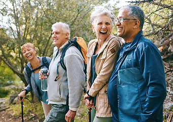 Image showing Nature, hiking and happy senior friends bonding, talking and laughing at comic joke in forest. Happiness, fun and group of elderly people trekking together for health, wellness and exercise in woods.