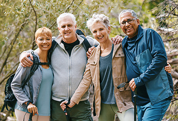 Image showing Senior hiking group, portrait and smile in nature, forest and happy for adventure together in summer. Friends, woods and happiness by trees, outdoor and sunshine for exercise, wellness and retirement