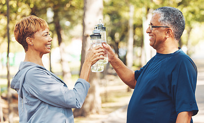 Image showing Water, happy or old couple in nature for fitness training, workout challenge target or exercise goals. Toast, cheers or or senior woman hiking, walking or exercising with mature partner in a park