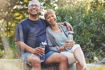 Image showing Nature, hiking and portrait of a senior couple resting while doing outdoor walk for exercise. Happy, smile and elderly man and woman in retirement trekking together for wellness in a forest in Brazil