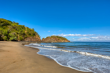 Image showing pacific ocean waves on rock in Playa Ocotal, El Coco Costa Rica