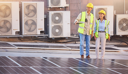 Image showing Solar panels, roof or engineering team planning photovoltaic construction for renewable energy development. Solar energy, innovation or engineers working on an industrial building or grid project
