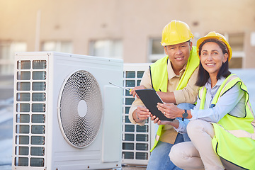 Image showing Air conditioner, building maintenance and teamwork with tablet, smile and development with engineer team. Engineering man, repair woman and digital tech in portrait with collaboration for ac repair