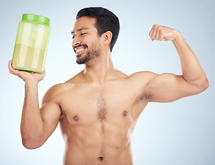 Image showing Fitness, man and protein powder for muscle gain, diet and weight loss on grey studio background. Male, athlete and body builder for sports nutrition container, supplement and healthy energy drink.