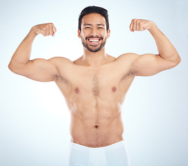 Image showing Fitness, biceps and portrait of a man flexing in a studio after an arm muscle training workout. Sports, health and strong Asian male bodybuilder after a strength exercise isolated by white background