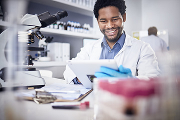 Image showing Scientist, research and black man with tablet, laboratory and innovation for healthcare, online schedule or tech. African American male, researcher and digital planning for medical diagnosis and cure