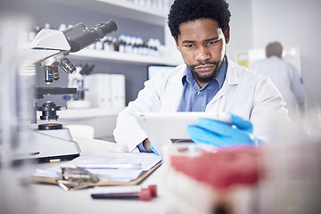 Image showing Science, research and black man with tablet, focus and innovation for healthcare and laboratory. Scientist, researcher or medical professional for diagnosis, concentration and online for cure or tech