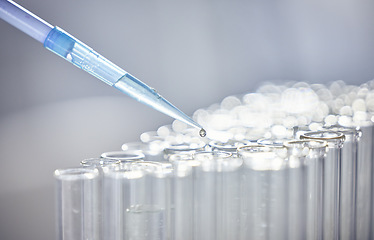 Image showing Science, test tubes and syringe for research, experiment or project in chemistry laboratory. Glass vials, innovation and chemical liquid for scientific innovation or analysis in a pharmaceutical lab.