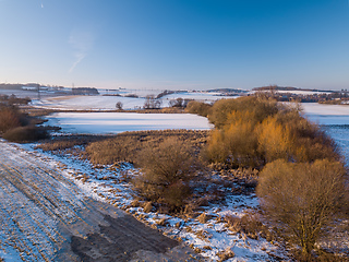 Image showing Winter landscape with frozen pond covered with snow. Czech Republic, Europe