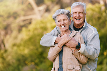 Image showing Nature, love and portrait of a senior couple hugging in a garden while on romantic outdoor date. Happy, smile and elderly people in retirement embracing in park while on a walk for fresh air together