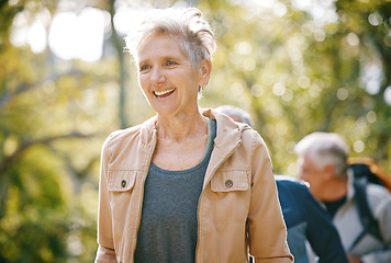 Image showing Elderly woman, fitness and hiking in park, happy with freedom outdoor and exercise with active lifestyle and wellness. Travel, hiking in Colorado and senior in retirement with happiness and nature.