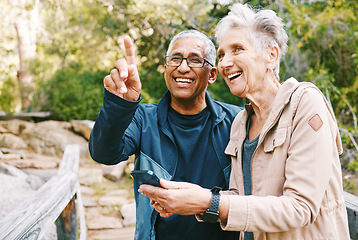 Image showing Relax, senior or couple of friends hiking, walking or trekking for freedom, exercise or fitness in nature forest. Interracial, travel or happy woman enjoys bonding time with healthy elderly partner