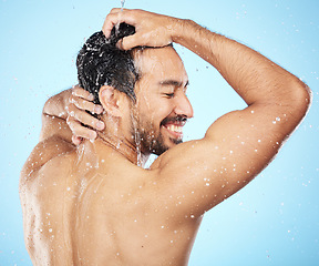 Image showing Shower, clean and man with water, beauty and body care with hygiene, grooming and skincare against studio background. Happy, healthy skin and cleaning body with hair care and water drop with wellness