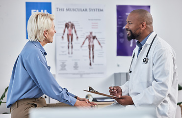 Image showing Health, doctor with patient and consultation with medical exam, hospital and conversation about healthcare. Black man with senior woman, clipboard with info for health care, medicine and clinic