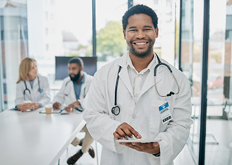 Image showing Portrait, black man and doctor with tablet, digital analysis and schedule surgery in hospital. African American male, medical professional and online research for cure, diagnosis and healthcare.