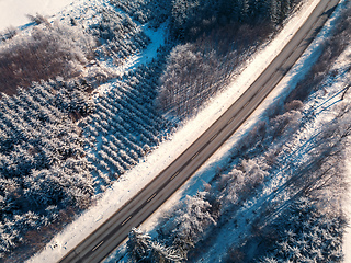 Image showing Aerial view of winter road, in sunny day