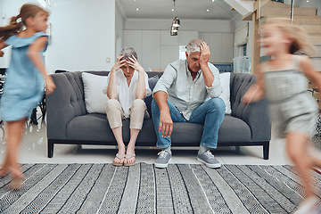 Image showing Burnout headache, children running and parents on living room sofa with migraine from hyper active kids. Mental health problem, family stress and senior grandparents tired from babysitting adhd girl