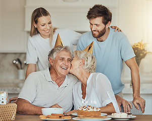 Image showing Happy birthday, kiss and senior parents with cake for party, celebration and festive event in home. Family, smile and elderly mother, father and couple with dessert, decoration and celebrate for love