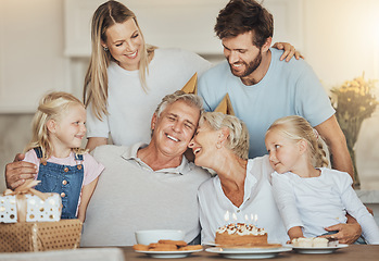 Image showing Birthday, family and grandparents and kids with cake for party, celebration and festive event in home. Happy, smile and elderly mom, dad and parents with dessert, decoration and celebrate for love