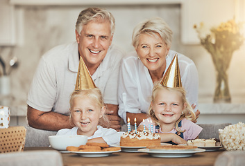 Image showing Portrait of grandparents, children and birthday cake for celebration with candles, love and sweets in home. Happiness, face of old man and woman together at table at girl kids party event in house.