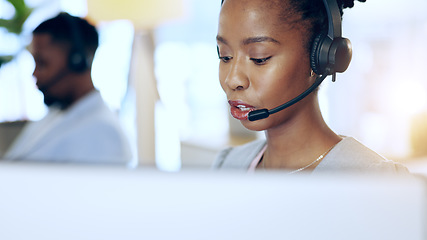 Image showing Call center, computer and black woman talk for telemarketing, support or contact us at help desk in office. Customer service, sales agent and African consultant in communication, crm and business