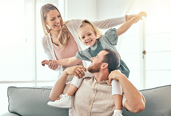 Image showing Airplane, fantasy and parents playing with child on a couch in a home together and bonding as a family with love. Care, happiness and kid happy with mother and father on a sofa for fun