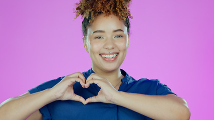 Image showing Heart, hands and portrait, woman with love sign and romance, care and support isolated on pink background. Health, wellness and charity with emoji or hand gesture in studio, feedback or review