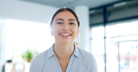 Image showing Happy, portrait and business woman in the office with confident, good and positive attitude. Smile, pride and headshot of professional young female lawyer from Canada standing in modern workplace.