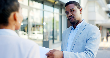Image showing Consulting, insurance and businessman or salesman talking to a client about a deal in a city. Advice, communication and African agent with a conversation in the street with a customer for retail