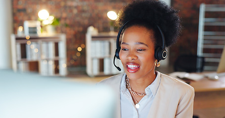 Image showing Woman, call center and computer in night, talk and office for telemarketing, voip mic and contact us. African consultant, crm and tech support agent for customer care, ideas or questions at help desk